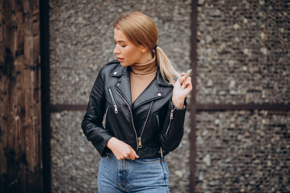 Women with black copped leather jacket